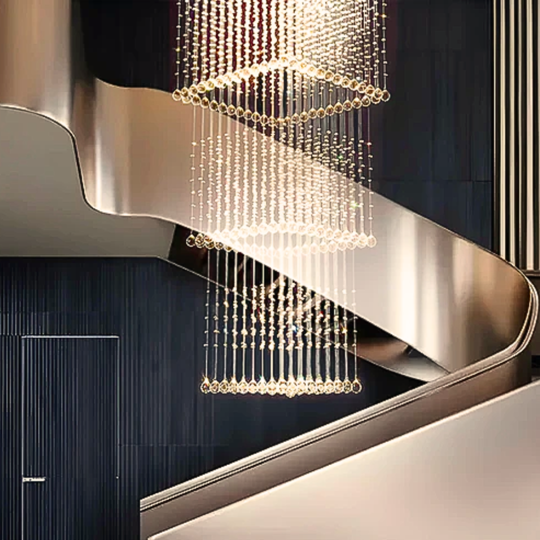 Modern staircase with a decorative chandelier in a stylish interior setting.