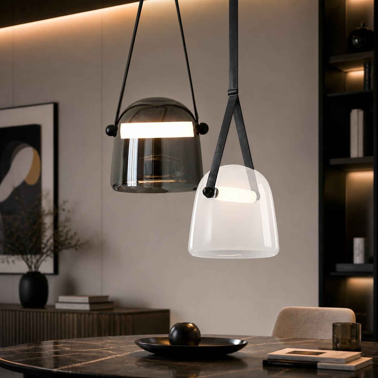 Modern pendant lights hanging above a dining table in a stylish room.