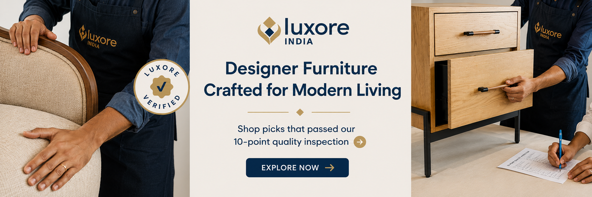 Promotional banner for Luxore India Designer Furniture, showing a person in a navy uniform holding a beige upholstered chair on the left, and another person in a navy uniform adjusting a light wood drawer on the right. The center features the Luxore India logo and text reading 'Designer Furniture Crafted for Modern Living' with a 'LUXORE VERIFIED' badge.